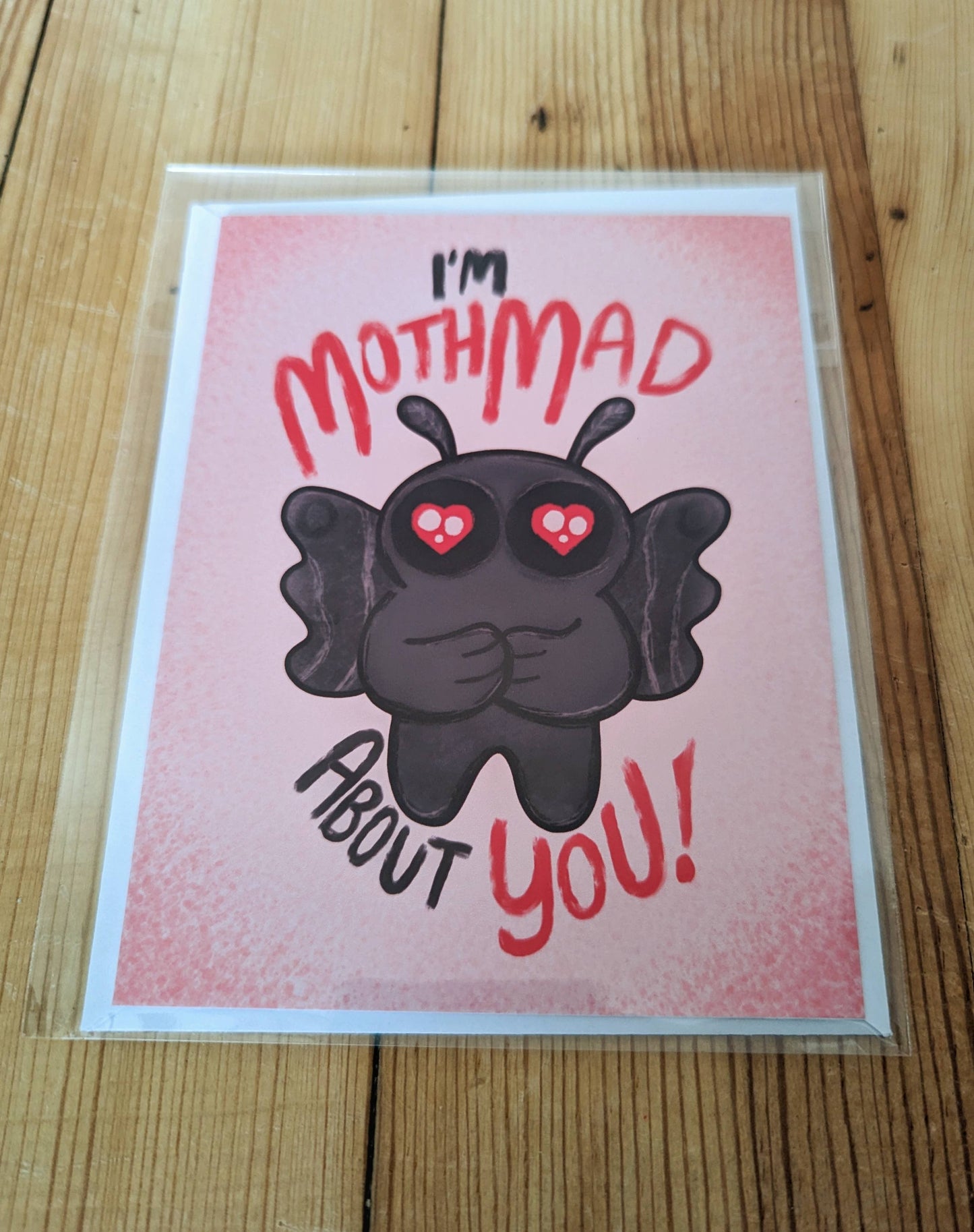 Mothmad About You - Cute Romantic Mothman Greeting Card: Brown (kraft) self seal envelope / Clear plastic cellophane packaging